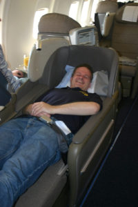 Although this photograph of me in a lie-flat seat on a flight from Paris to New York operated by OpenSkies back in June of 2008 was taken with my camera, I forgot who took the actual picture. I believe it might have been Ben Schlappig...