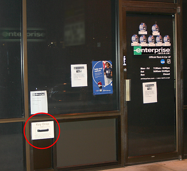 This is the front of the office of Enterprise Rent A Car; and the key drop box is located in the red circle. Photograph ©2013 by Brian Cohen.