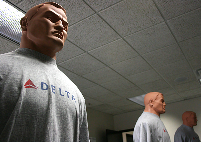 These mannequins help flight attendants defend themselves should they encounter an aggressively unruly passenger. Photograph ©2013 by Brian Cohen.