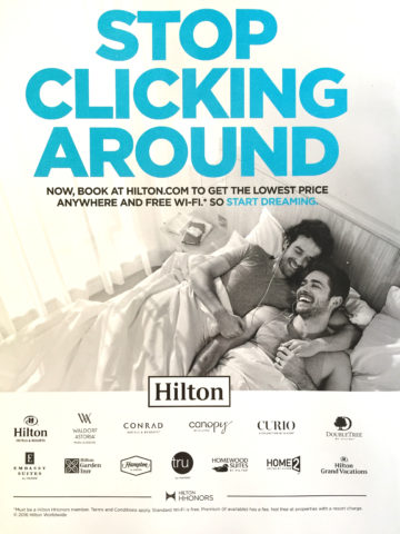 Hilton advertisement two men in bed together