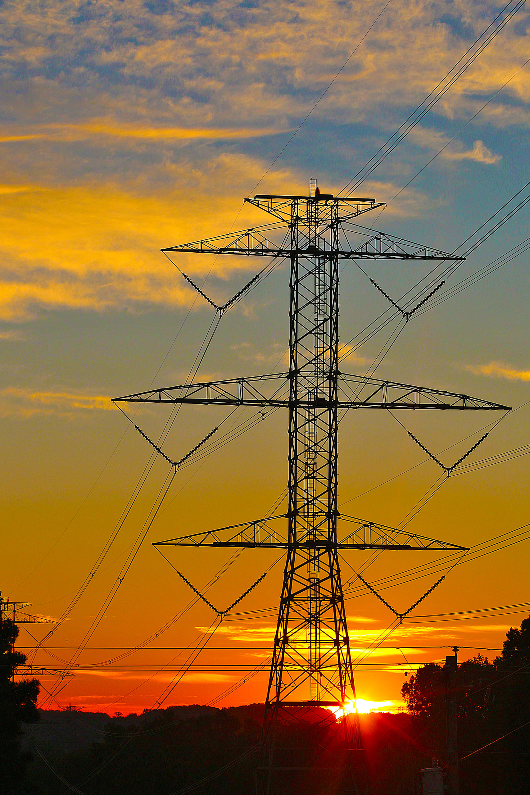 Electric power lines sunrise
