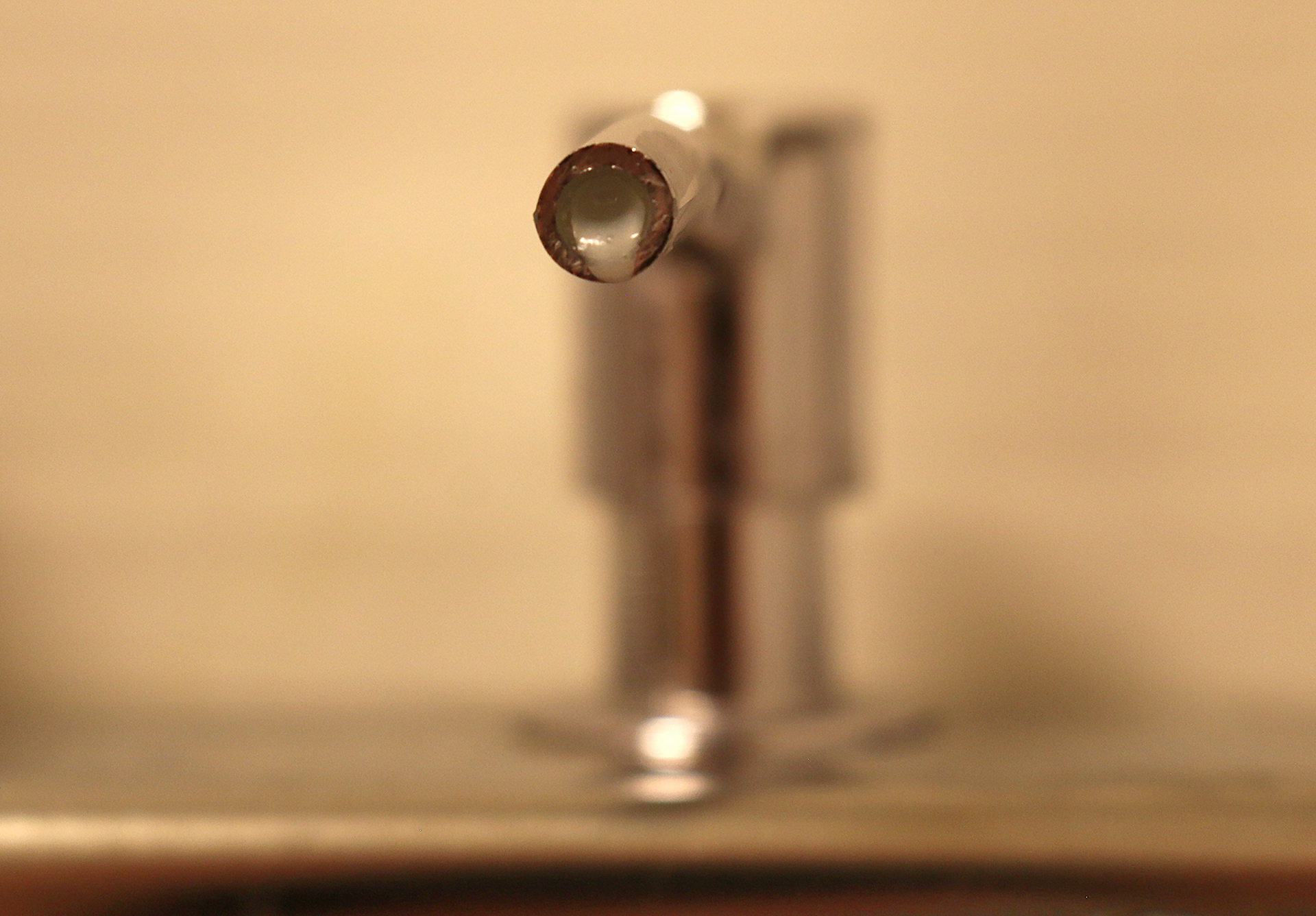 Bulk dispenser nozzle